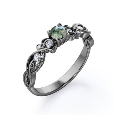 Il solido tagliato brillante venato con precisione Moss Green Agate e l'anello di fidanzamento a filigrana di stile vittoriano di Moisssanite