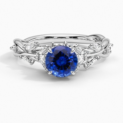 Sapphire Capella Three Stone Lab creata laboratorio CZ Ring Set con lo zaffiro creato laboratorio ovale blu di 9x7mm
