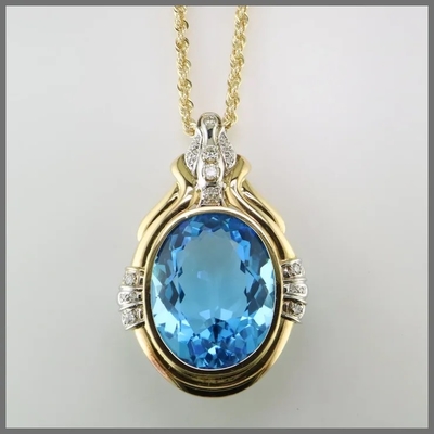 14K in tondo ha tagliato il pendente blu di Topaz And CZ migliora per le donne