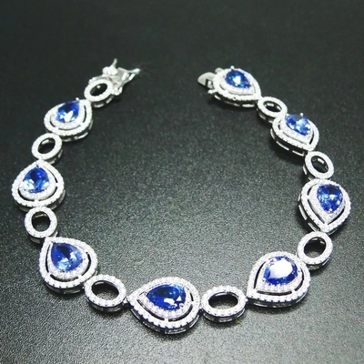 Braccialetto stupefacente d'argento di qualità di Tanzanite del taglio della pera per le donne
