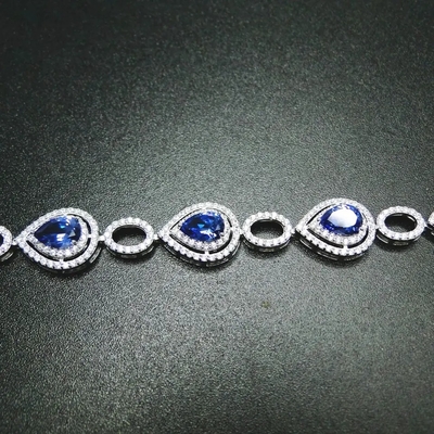 Braccialetto stupefacente d'argento di qualità di Tanzanite del taglio della pera per le donne