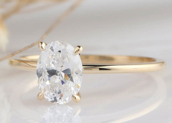 dimensione tagliata ovale del materiale 0.7×0.9cm dell'oro dell'anello sviluppata laboratorio 14K di 1.5ct Moissanite