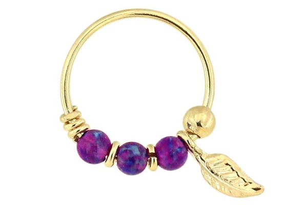 Piercing del naso dell'oro 18K di spessore 0.6mm con la pietra rotonda di 2mm