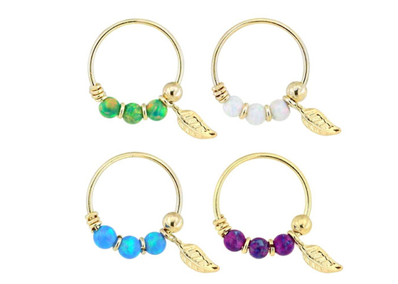 Piercing del naso dell'oro 18K di spessore 0.6mm con la pietra rotonda di 2mm